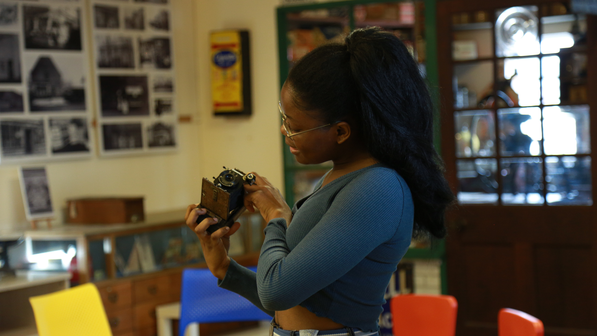 Film director and producer, Alessia Mavakala. In the picture I’m holding a very old camera, found at the Burwell Museum. My friend and co-worker captured my joy, while we were recording footage for the short documentary ‘Balik Arts in Burwell’. Photography: Oykü Vidinli.